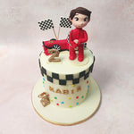 The red Ferrari, positioned prominently on top of this Ferrari Cake, commands attention with its sleek design and vibrant colour. 