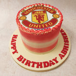 For the ultimate fan, the centrepiece of this red and white ombre cake is iconic and none other than the Manchester United logo, proudly displayed on top. 