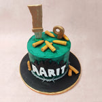 An edible knife is embedded into the Fortnite Battle Royal cake, symbolising the tools of battle wielded by Fortnite players. 