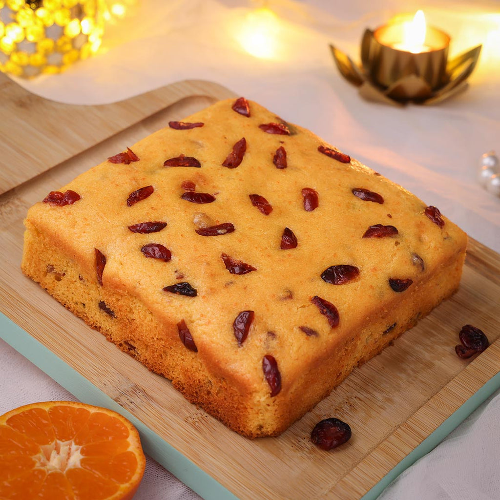 Freshly baked cranberry orange teacake with dried cranberries for Diwali