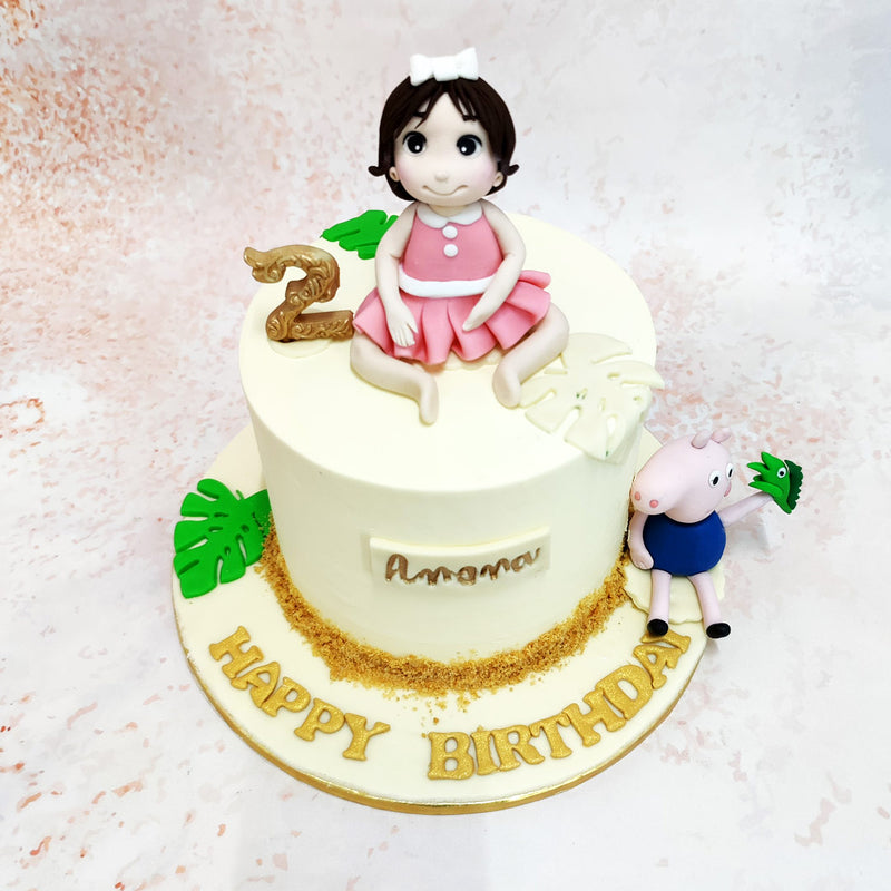 Seated beside her is George Pig, Peppa Pig’s beloved brother, holding his signature toy dinosaur, adding a fun and familiar touch to this Girl Theme Cake.