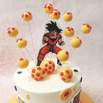 Rising from this Goku Cake are meticulously crafted Dragon Balls, each topped with the signature red stars, a detail that fans will instantly recognise. 