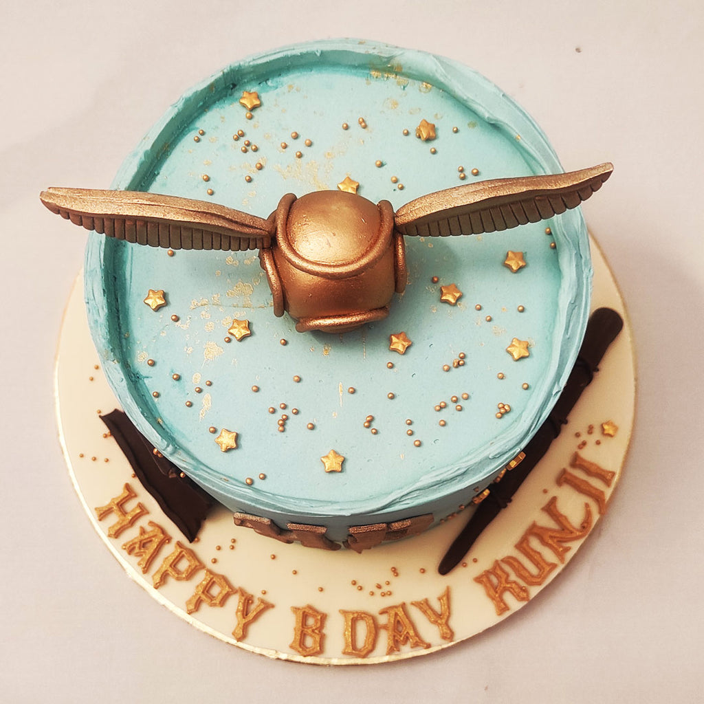 Golden snitch Harry potter cake - Decorated Cake by Rock - CakesDecor