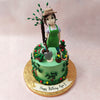 As far as green garden cake go, ours is as picturesque as they come, with an edible figurine of a lady in gardening overalls and a hat standing in front of all she has planted. 