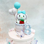 The carefully chosen shades of pink, purple and blue blend seamlessly across the tiers of this Hello Kitty Theme Cake, creating a calming, almost ethereal backdrop that highlights the character’s gentle and kind-hearted nature.
