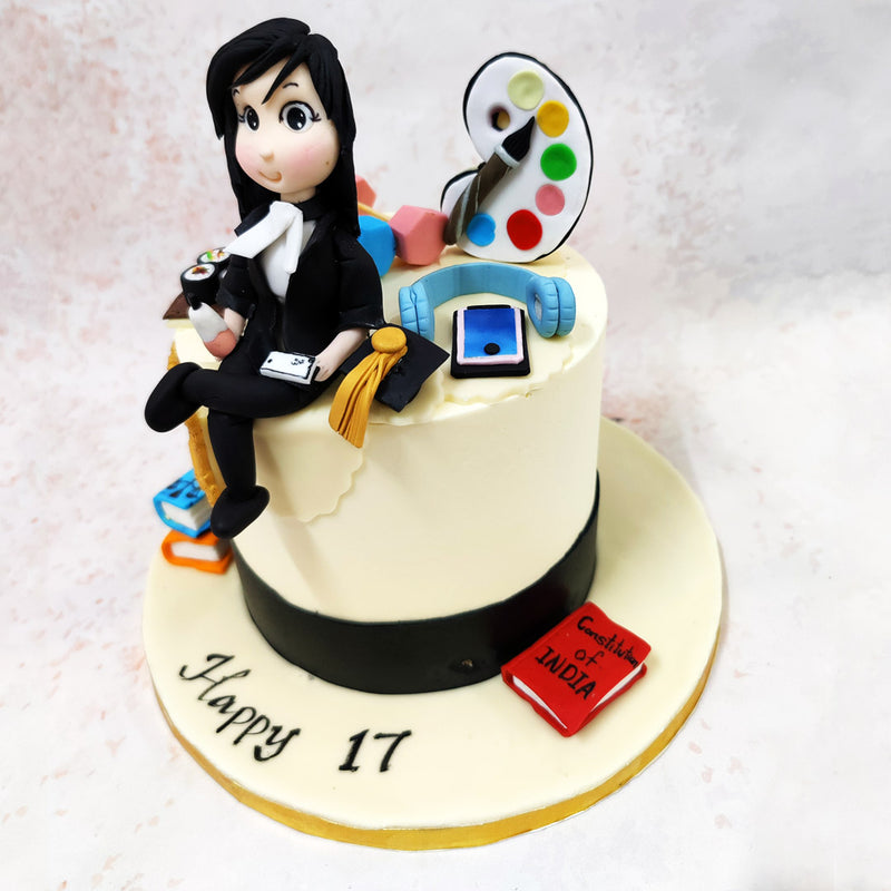 The centrepiece of this Hobbies Cake showcases a detailed character in professional attire, complete with a crisp white cravat and smart black suit, symbolising the transition into the world of career aspirations and professional dreams.