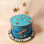 The opulence extends to the centrepiece of this Blue and Gold Sagittarius Cake, where the Sagittarius symbol takes its place, a golden emblem resonating with the cosmic energies.