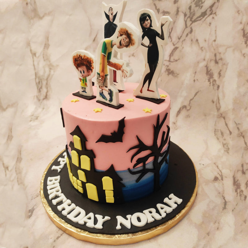 The centrepiece of this Hotel Transylvania birthday cake for kids is a beautifully crafted silhouette of the iconic Hotel Transylvania and spot poster figures of some of your favourite characters from Hotel Transylvania. 