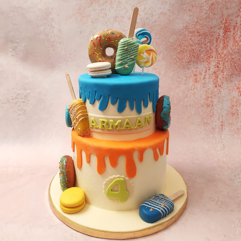 Two decadent tiers of a dessert theme cake design, this piece features two bases recreated in the likeness of melting ice cream. 