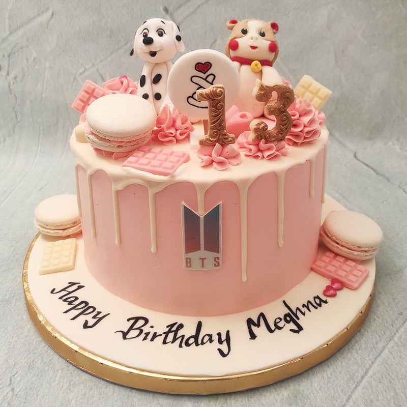 This eye-catching Korean heart cake features a light pink base that sets the perfect canvas for an explosion of delightful decorations