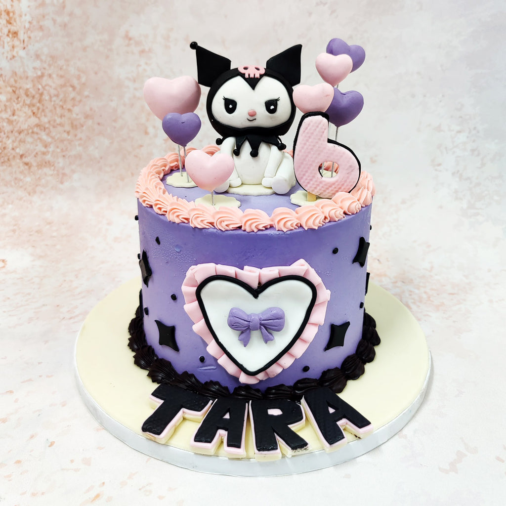 The soft pastel lilac and pink tones on the base of this Kuromi Cake create a whimsical contrast against Kuromi’s signature bold black and white figure sitting proudly atop. 