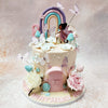 And there, nestled before the rainbow on this Fairy Garden Cake, is our delightful fairy, her wings glistening in the soft glow of the forest. 