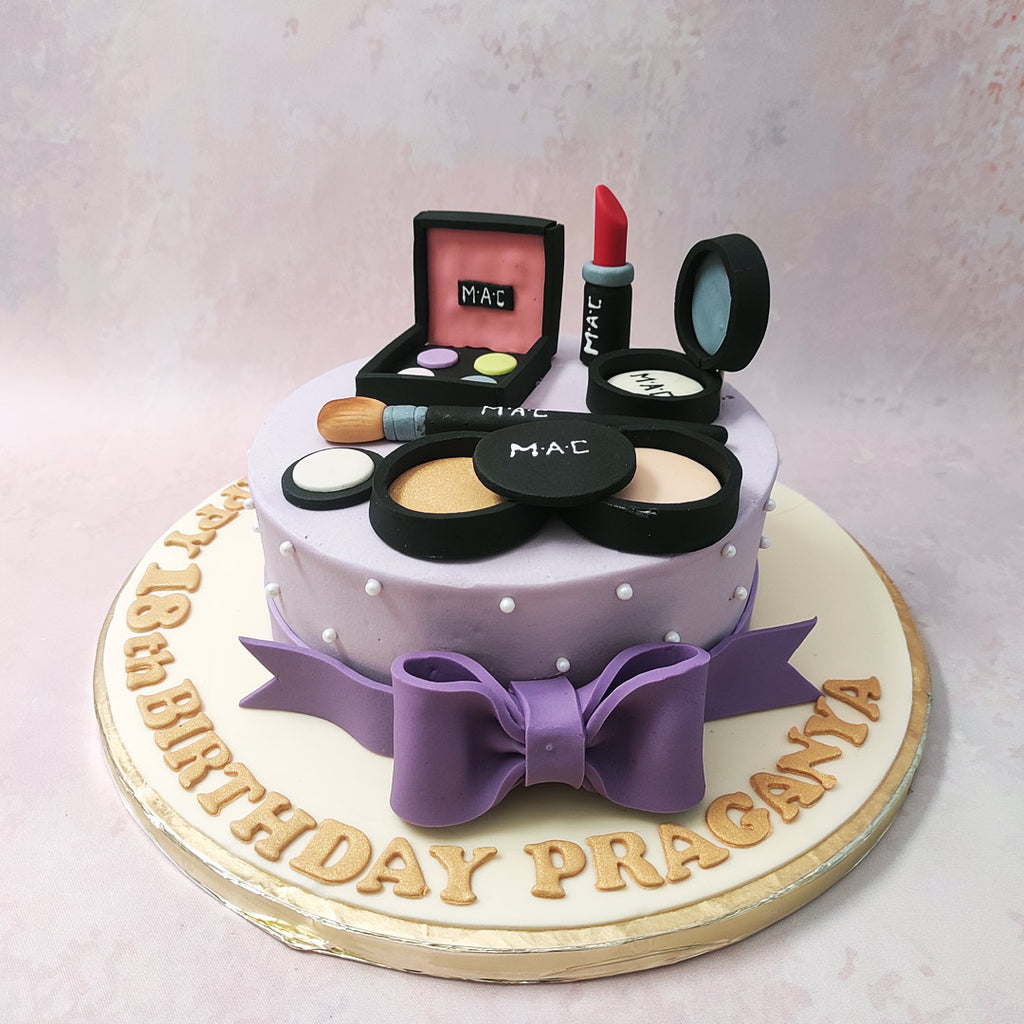 Here's a cake that looks every bit as good as it tastes, presenting the MAC makeup cake. This may be a makeup theme cake but how delectable it is definitely not made up.