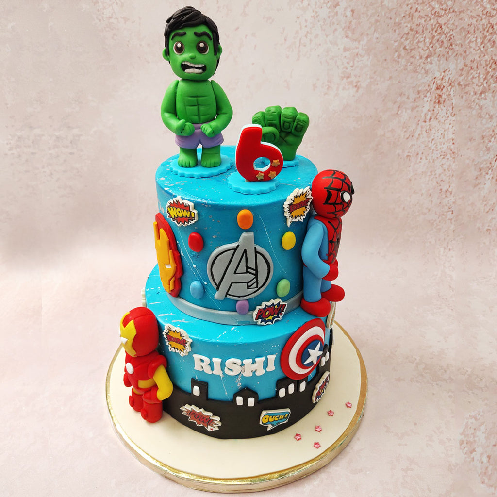 Essentially a Ironman, Hulk and Spiderman cake, here we have two blue tiers of Marvel themed madness. 