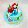 Surrounding her are delightful marine companions, including a cheerful crab and a playful white fish, each brimming with character and adding a lively touch to the underwater tableau on this Mermaid and Crab Theme Cake. 