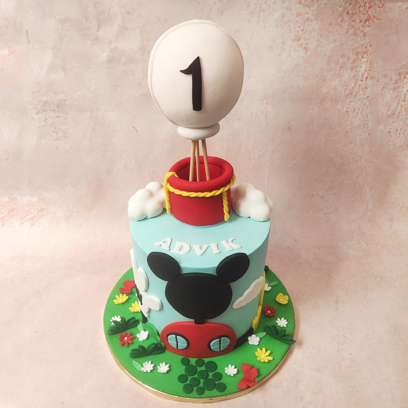 The light sky-blue canvas of this Mickey Theme Cake  serves as the backdrop for clouds, balloons and childhood dreams each telling stories of adventures with Mickey and his pals. 