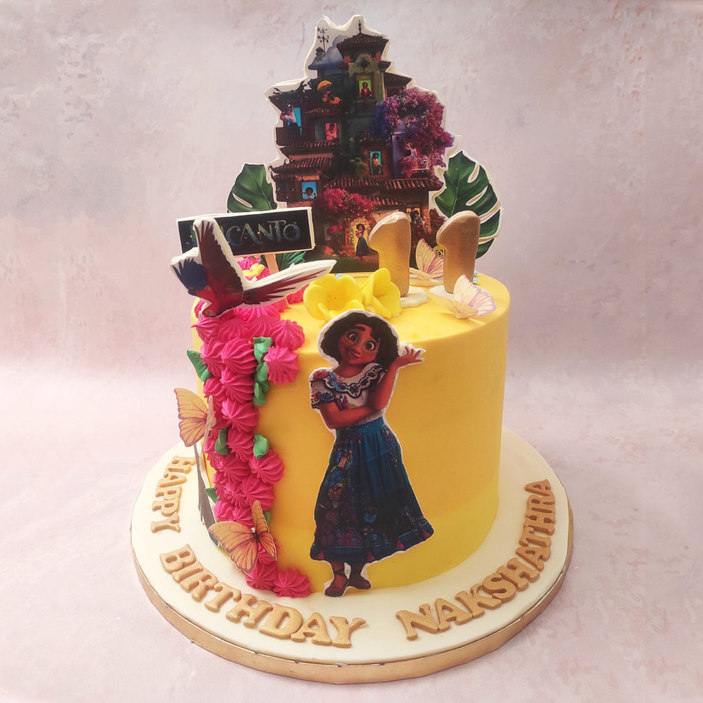 The Disney cake features a bright yellow base, reminiscent of the sunny and cheerful atmosphere of Casa Madrigal. 