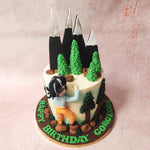 Nestled amidst the towering giants on this rock climbing cake is a quaint woodland area. 