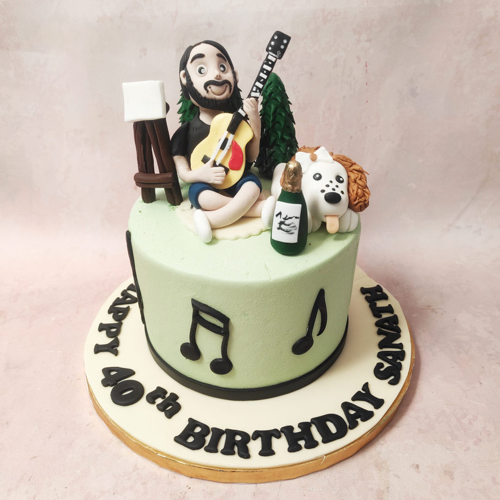 The light green base of this Musician Cake, adorned with a sleek black ribbon at the bottom, serves as the canvas for a symphony of musical notes – quavers and semiquavers intricately drawn out in black buttercream.