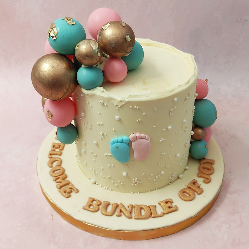 Playing with the traditions of pink for girl and blue for boy in the colour palette, this baby feet cake carries forward all the sentiments of a gender reveal with the underlying message of "he or she, what will it be?" 
