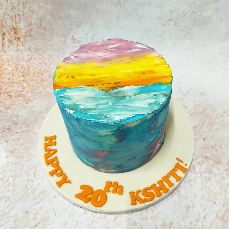 This Painting Cake  is just a canvas alive with hues that transition from the tranquil blues of a serene ocean to the fiery oranges of a setting sun, culminating in the regal purples of twilight. 