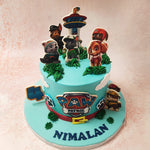 At the heart of the action on this Blue Paw Patrol Cake sits the Paw Patrol logo, a symbol of bravery and teamwork. 