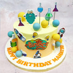 The highlight of this Peekaboo Cake is the bold edible cut-out of Dr. Binocs himself, perched with wide-eyed excitement among a forest of bubbling beakers and test tubes. From vibrant green potions to bright blue flasks, each topper captures the whimsy and wonder of at-home experiments and animated learning.