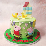  Frosted in a velvety, green buttercream that highlights the pink tone of Peppa Pig’s skin and creates a scenic setting, this Peppa Pig duck cake design is a massive tribute to the beloved character that has been stealing children's hearts since 2004.