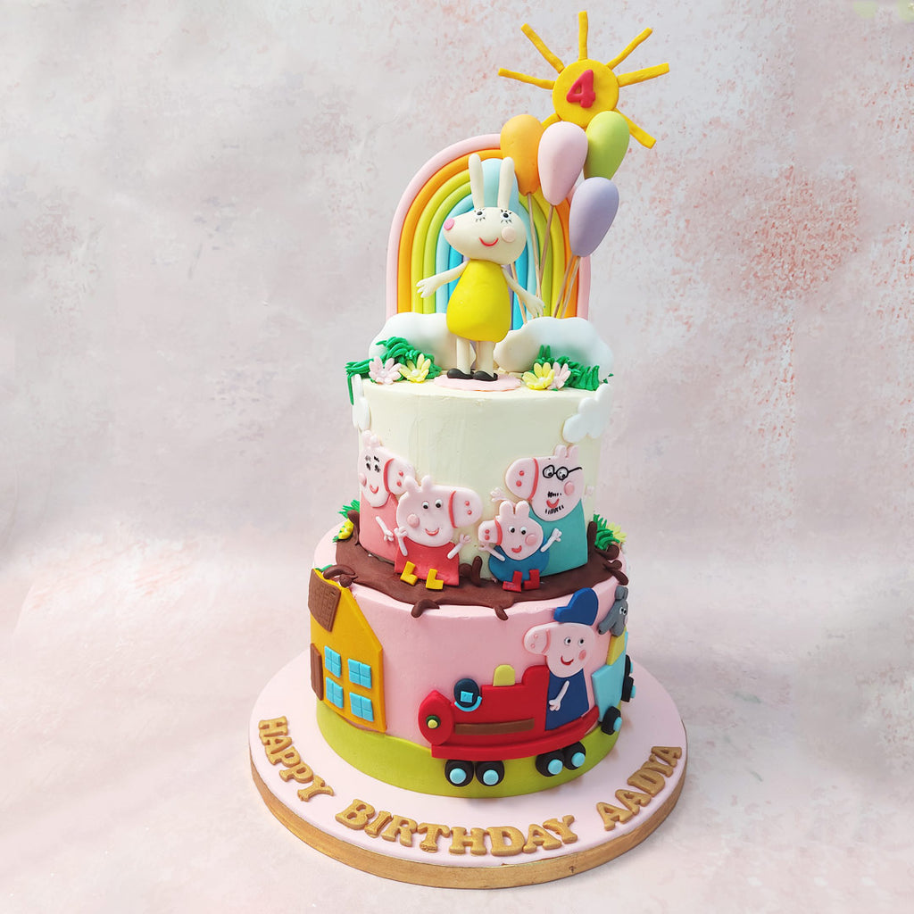 The bottom tier of this Rebecca Rabbit Cake features a bustling scene straight out of the "Grandpa Pig's Train to the Rescue" episode. 
