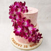  The fresh blue and purple orchids that have been embedded into this pink cake with fresh orchids in a manner that perfectly ties together the theme and enhances the colour palette.