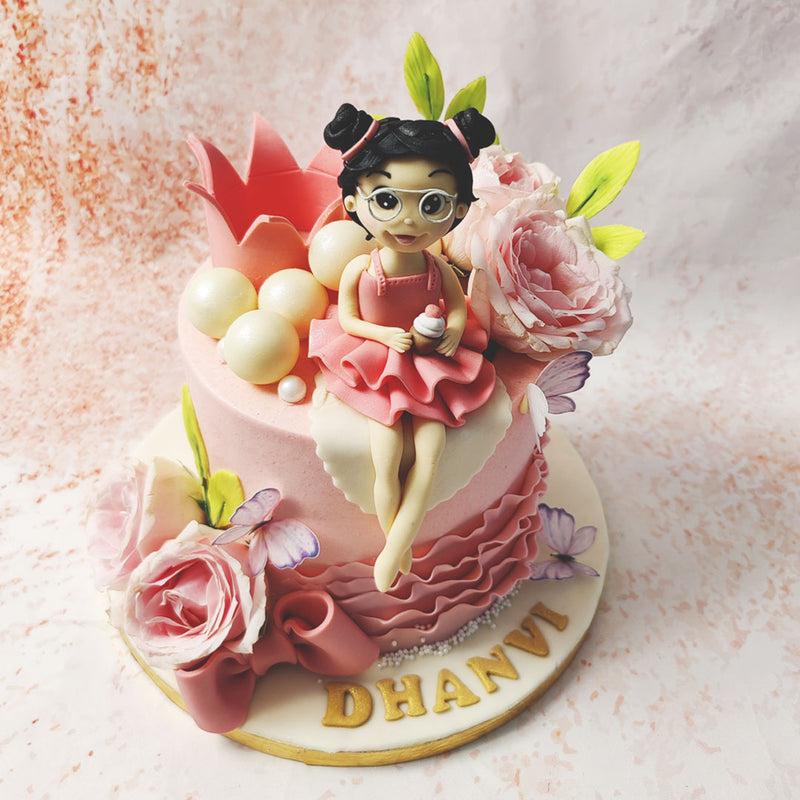 This Pink Floral Cake is adorned with gentle touches of floral artistry, where pastel pink roses bloom alongside delicate butterflies, symbolising grace, transformation, and the beauty of nature.