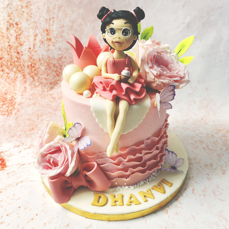 This enchanting Pink Princess Cake is a celebration of elegance and charm, capturing the delicate beauty of a little ballerina perched gracefully atop a soft pink confection. 