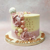 Embedded with decadent macarons to complete this sumptuous and scrumptious, ombre floral cake, this design features a soft and feminine aesthetic which is every bit as artistic as it is realistic.