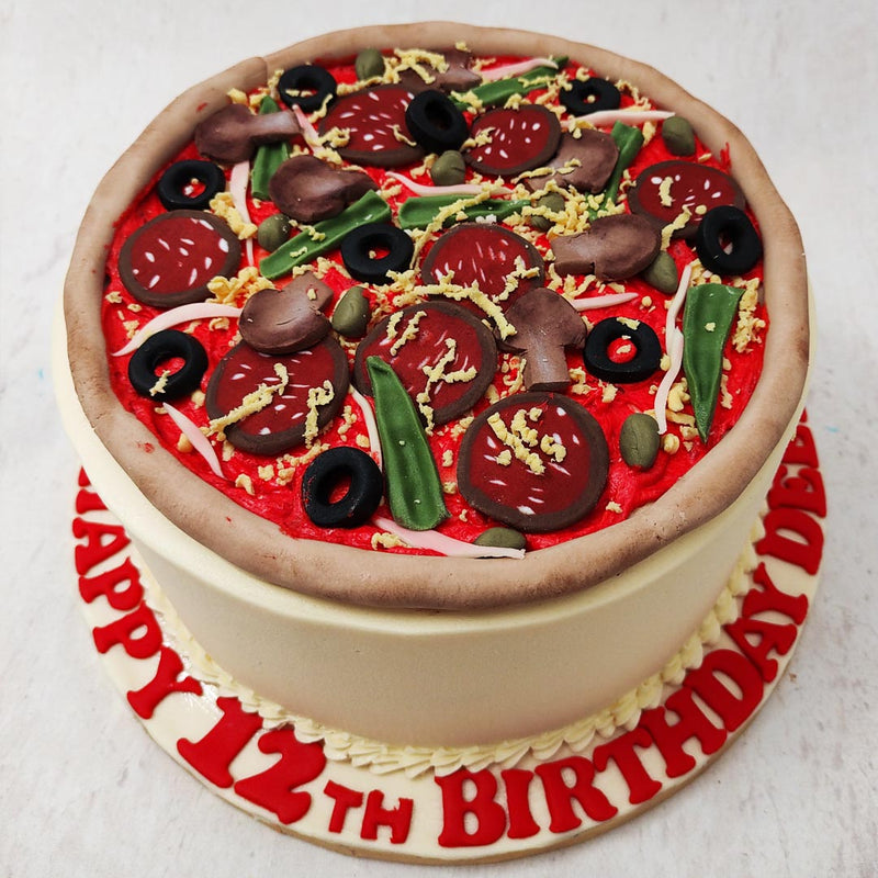 With a plain, white base, resembling a food display stand, a very realistic looking figurine of pizza sits on top of this pizza birthday cake. 