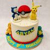 Spot these four figurines spread out on this white-based Pokeball cake which centres around a life-sized Pokeball whose bright red top is reflected on the beaded buttercream piping on the base! 