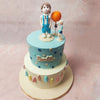 But the star of this Polka Dot Cake is a little boy in light blue dungarees with an edible orange balloon beside him. 