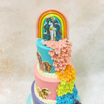 The cascading waterfall of fondant flowers in colours matching the Elements of Harmony - from Pinkie Pie pink through Applejack orange, Fluttershy yellow, Rainbow Dash blue, and Twilight Sparkle purple - creates a spectacular dimensional design on this Pony Birthday Cake worthy of a Canterlot royal celebration.