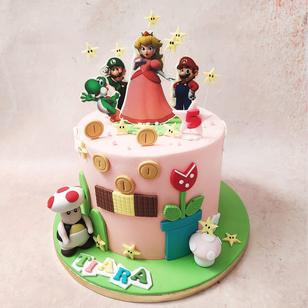 On the enchanting light pink base of this Mario and Luigi Cake, edible figurines of Mario and Luigi stand tall, joined by Princess Peach, reigning over her sugary domain. 