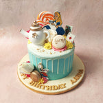 The mischievous White Rabbit, watch in hand, pops out from the bottom of this Alice in Wonderland Cake, reminding you that in Wonderland, time has a flair for the dramatic.