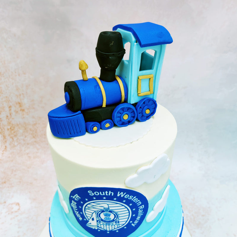 The engine on this Railway Retirement Cake is a nod to the tradition of steam-powered locomotives, which were iconic symbols of adventure and progress. 