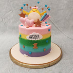 With a rainbow base, ornamented with stars and hearts, this rainbow chick cake takes on somewhat of a celestial theme.