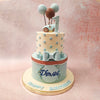 Featuring a baby blue bottom tier, resembling a beautifully wrapped gift box, while the top tier is adorned with a pristine white base and playful blue polka dots, this toy car balloon cake is the cake you can have and eat! 