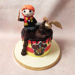 At the centre of this Gryffindor cake, you will find the proud Gryffindor crest, symbolising courage, bravery, nerve, and chivalry - traits that define our beloved character, Ron Weasley. 