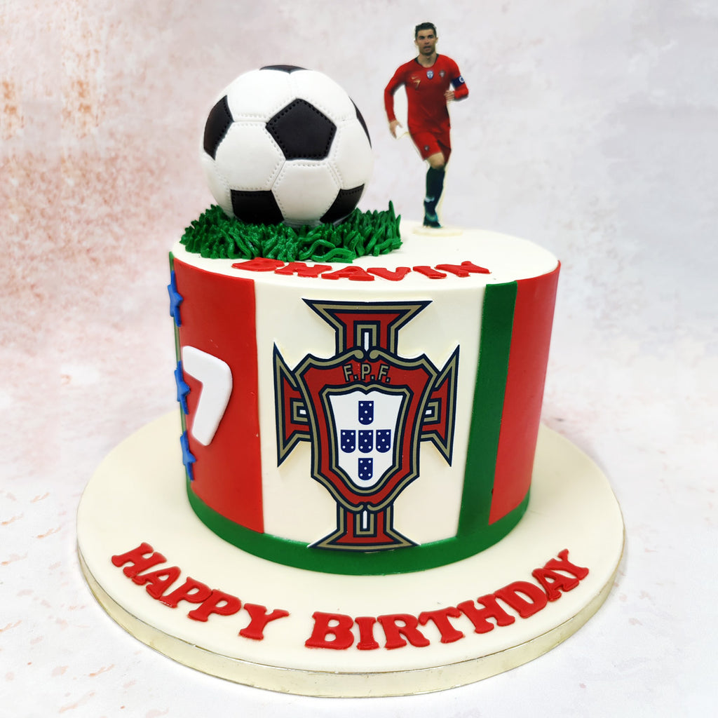 This Ronaldo Portugal Cake celebrates the beautiful game with its stunning Portuguese football-inspired design. 