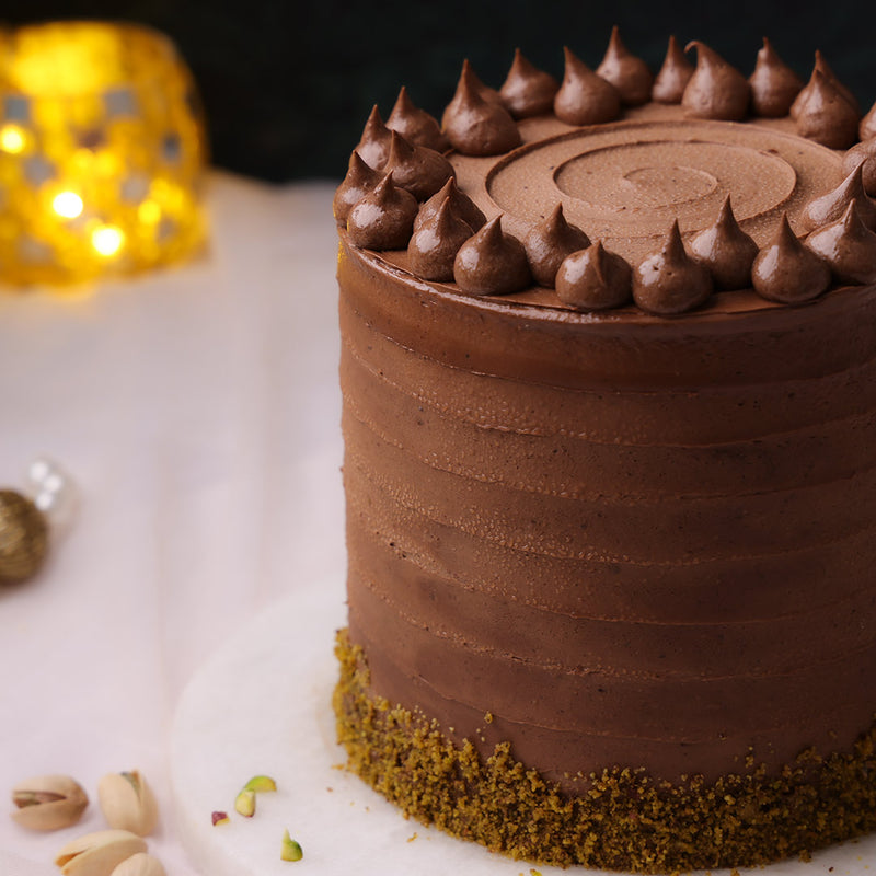 Side view of chocolate pistachio cake