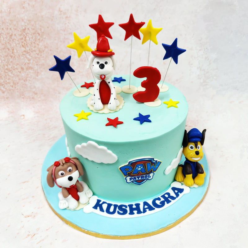 Spot Chase in his signature police uniform, Marshall sporting his iconic red hat, and another pup ready for action on this Sky Paw Patrol Cake.