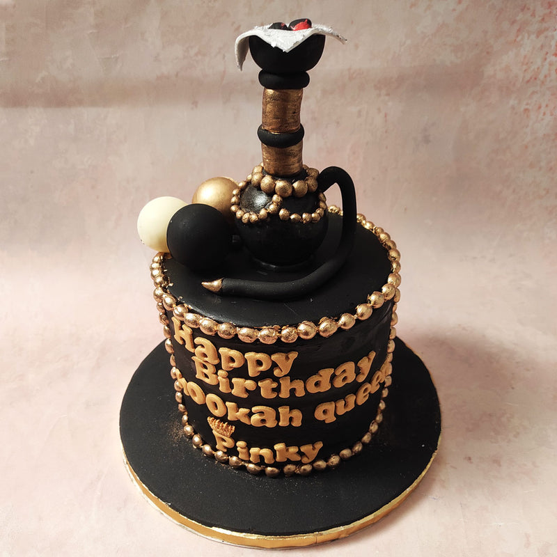 The hookah cake is draped in a luxurious black fondant base, symbolising the mystery and allure that surrounds hookah culture.  