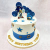 Set against a creamy white backdrop, the vibrant blue accents, star embellishments, and golden ring details on this Sonic Ring Cake pay homage to Sonic’s legendary journey through Green Hill Zone. 