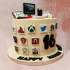 This laptop cake design also features a workstation with a laptop, earphones, a sketchpad, coloured pencils and a stylus. 