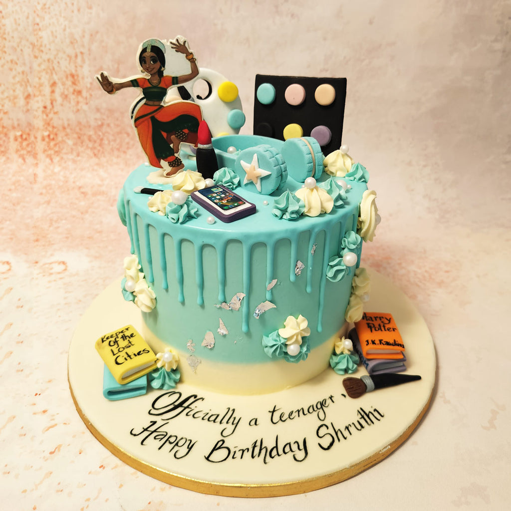 Embellishments around this Bharatnatyam Cake tell the story of a modern teenage girl's journey. 